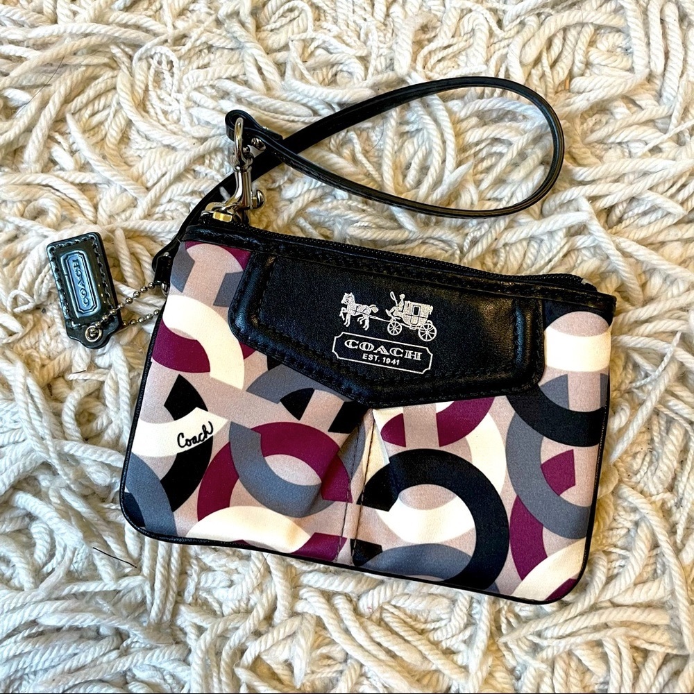 Vintage Coach Madison wristlet with purple logo print